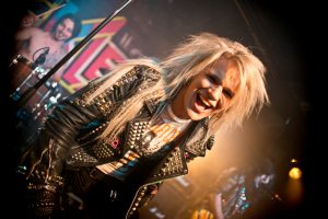 Berlin, Germany - May 4, 2014: Reckless Love, glam metal band from Kuopio (Finland), with its vocalist Olli Herman and drummer Hessu Maxx giving a concert in Berlin (Germany) Comnet Club in 2014.